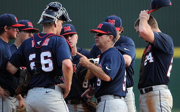 Ole Miss coach Mike Bianco instructs his players during a March 16, 2013 game at Baum Stadium in Fayetteville.