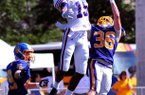 Highly recruited receiver Malachi Dupre is related to Arkansas receivers coach Michael Smith.  