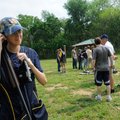 Safety is the No. 1 emphasis of the trap shooting team. Madeline Medina checks hearing protection be...