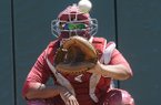 Arkansas Razorbacks catcher Jean Ramirez works with his pitchers Friday afternoon during the Razorbacks' practice at Samford University in Birmingham, Ala. 