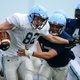 Zach Vaughn, left, ...