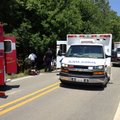 Emergency officials respond to a fatal vehicle accident Friday, May 24, on Arkansas 161 in Scott.