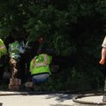 Emergency officials respond to a fatal vehicle accident Friday, May 24, on Arkansas 161 in Scott.
