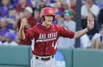Arkansas' Brian Anderson celebrates after scoring a run against Kansas State in the first inning in an NCAA baseball regional game in Manhattan, Kan., Sunday, June 2, 2013. (AP Photo/Jeff Tuttle)