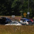 Police during a standoff with a man in a Walmart Neighborhood Market parking lot Wednesday morning.