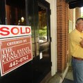 New building owner Jim Huson speaks to passersby Wednesday, June 12, 2013, at the old post office bu...