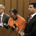 Ariel Castro, center, stands before a judge with his defense attorney's, Jaye Schlachet, left, and C...