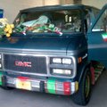 Police examine Rainbow Kilo Rasphoumy’s van following a stand off Wednesday in Springdale. 