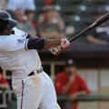 Matt Fields of the Northwest Arkansas Naturals takes a big swing Thursday during the first game of a...