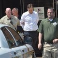 Washington County sheriff’s deputies escort Brandon Barber out of the John Paul Hammerschmidt Federa...