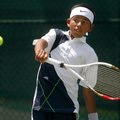 Seth Hernandez, 12, of Springdale returns a shot during his match on Friday during the Colgate Junio...