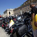 Harley Davidson motorcycles riders park their motorcycles in Via della Conciliazione leading to the ...