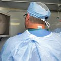 Dougherty, right, teaches Dr. Ken Seiter, a surgical podiatrist from Fort Smith, on Tuesday how to d...