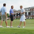 Steven Dixon, right, the Chick-A-Tee Invitational champion, is congratulated by foursome members, fr...