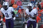 Kevin Shorter (3) looks to block for D.J. Dean. 