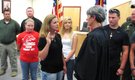 Widow to complete term of sheriff killed in flood