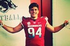 Defensive end Karl Roesler turned down scholarship offers to walk on at Arkansas. 