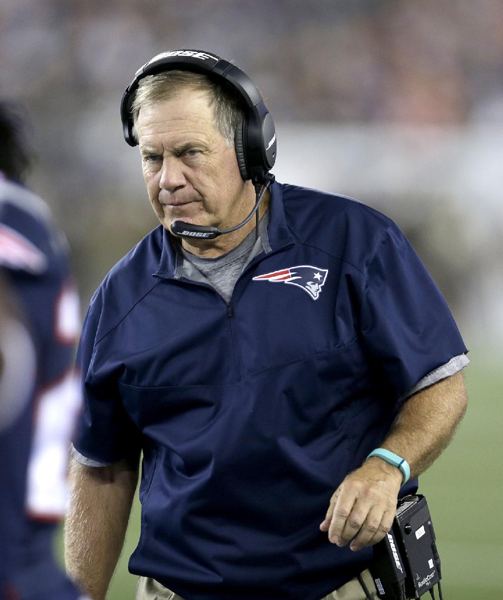 New England Patriots head coach Bill Belichick watches ...