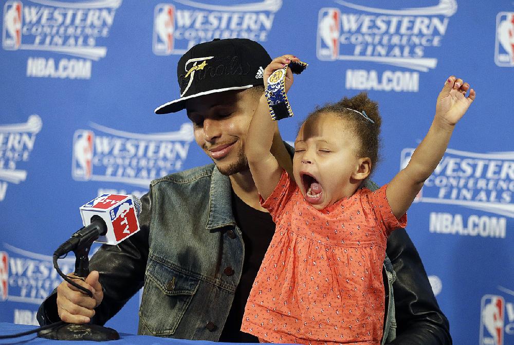 Golden State Warriors guard Stephen Curry and his daughter, Riley, 