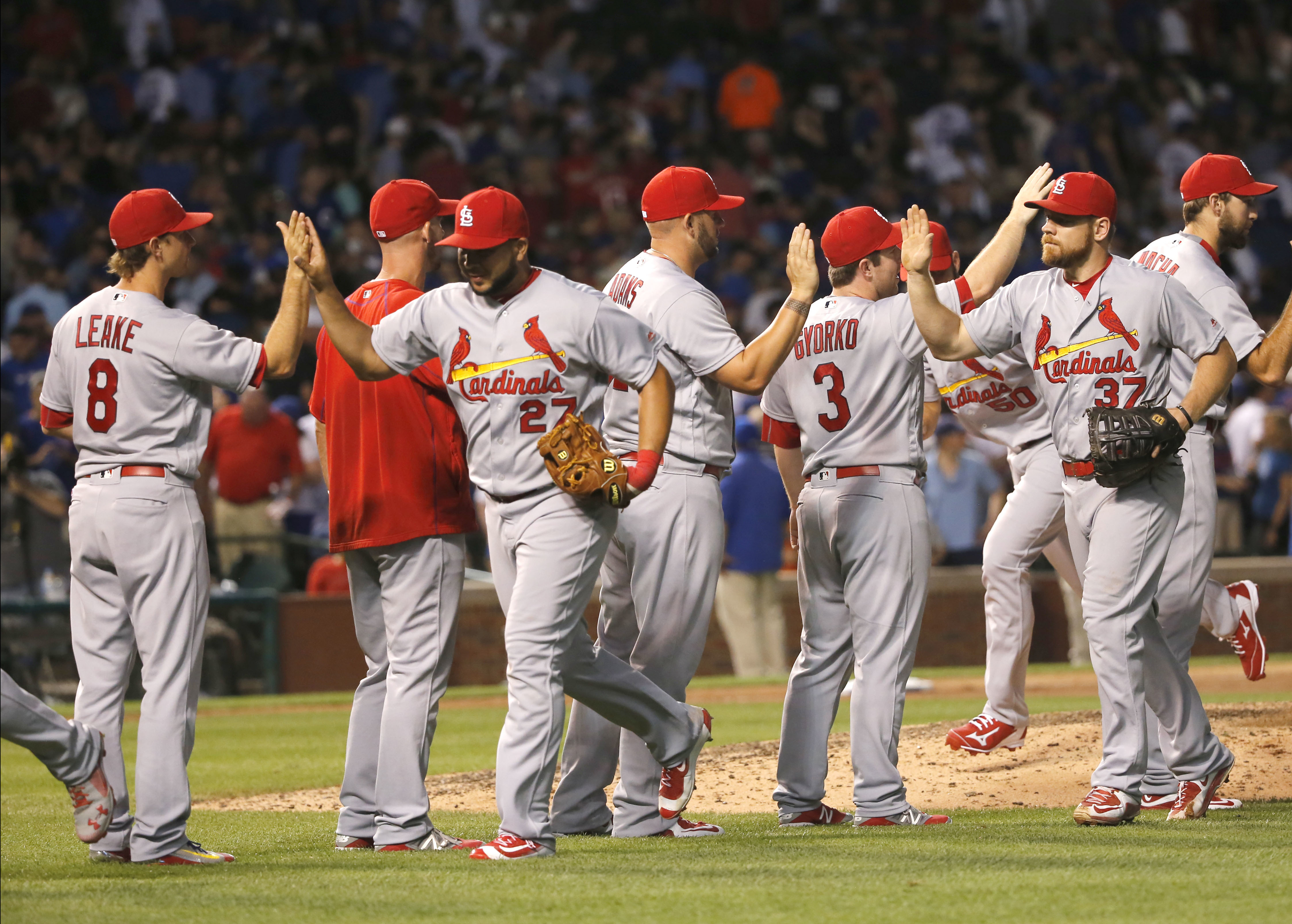 The St. Louis Cardinals celebrate the team's 32 win over