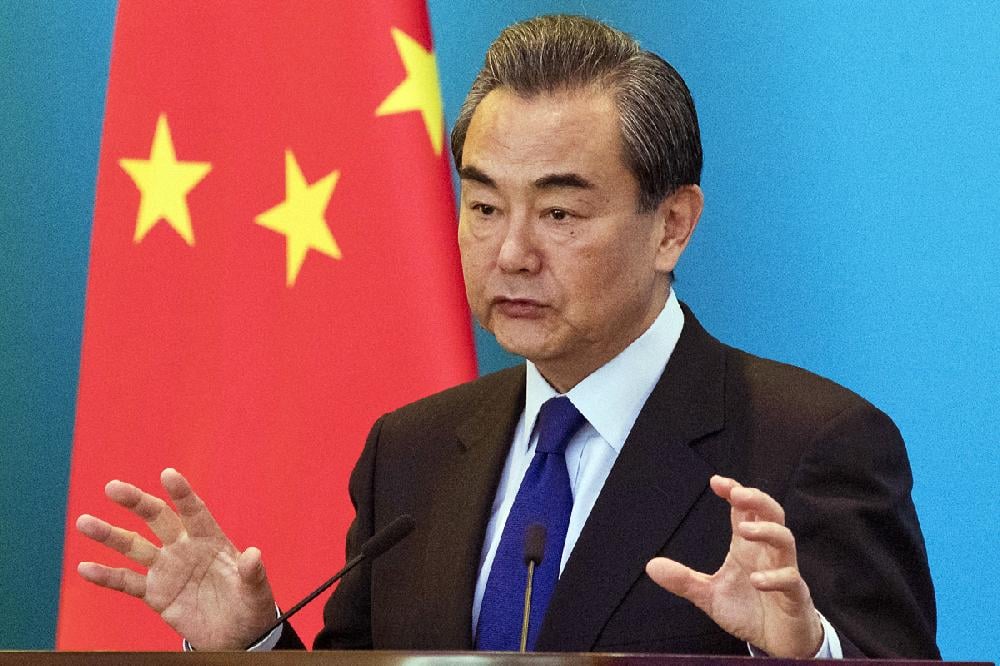 China's Foreign Minister Wang Yi speaks during the opening of