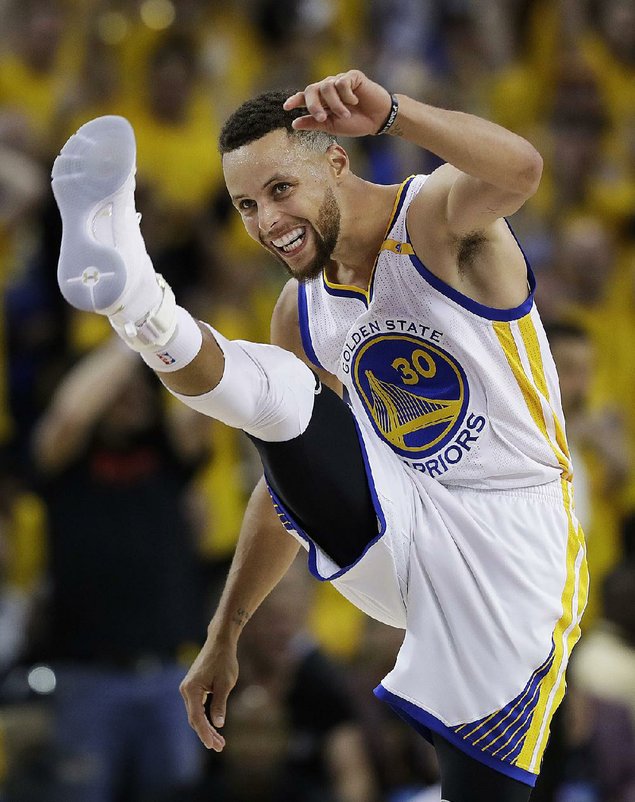 Curry's triple-double leads Warriors to Game 2 rout