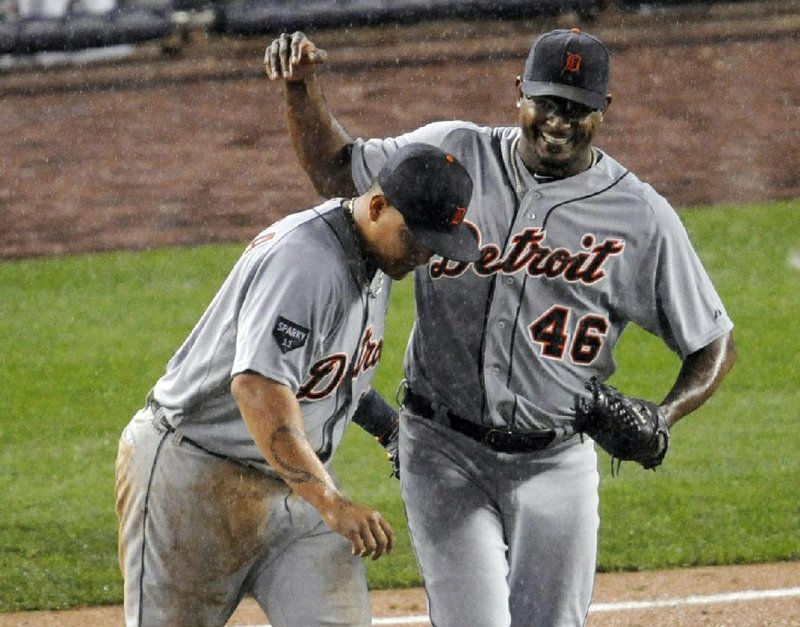 Detroit Tigers' Curtis Granderson walks off the field after the