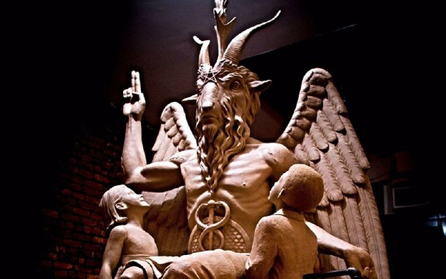 this-2014-photo-provided-by-the-satanic-temple-shows-a-bronze-baphomet-which-depicts-satan-as-a-goat-headed-figure-with-two-children