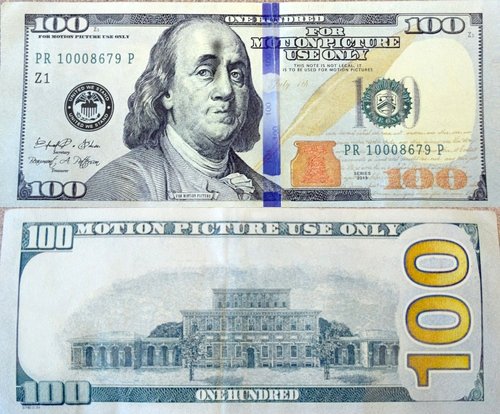 Police looking for person who passed phony $100 bill to business
