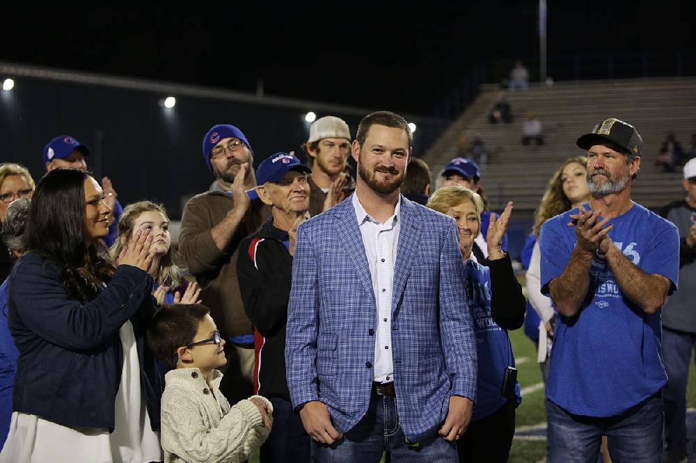 Bryant's Travis Wood takes off his shirt at Cubs rally