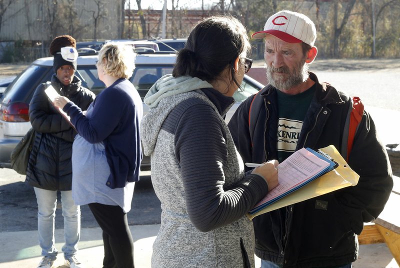 File Photo Nwa Democrat Gazette David Gottschalk Jessica Andrews Left Ceo Of 7 Hills Homeless Center Speaks Jan 25 With Jimmy Morgan As She Fills Out A