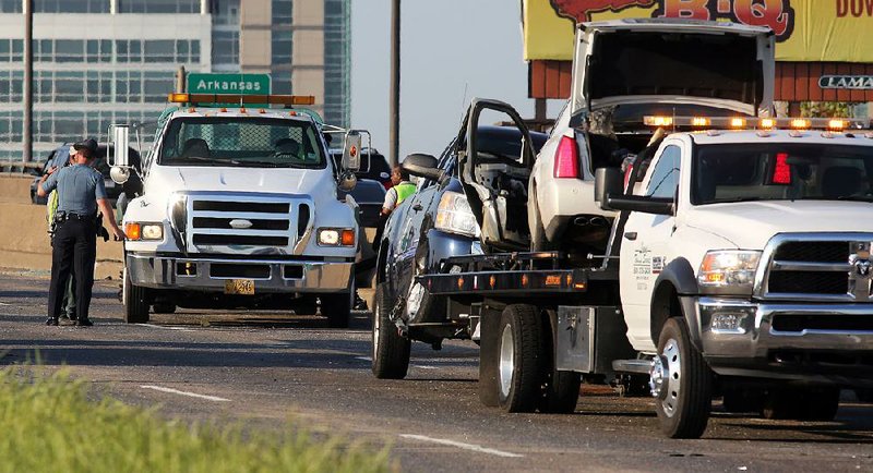 Chain-reaction crash on I-30 at Arkansas River bridge kills driver