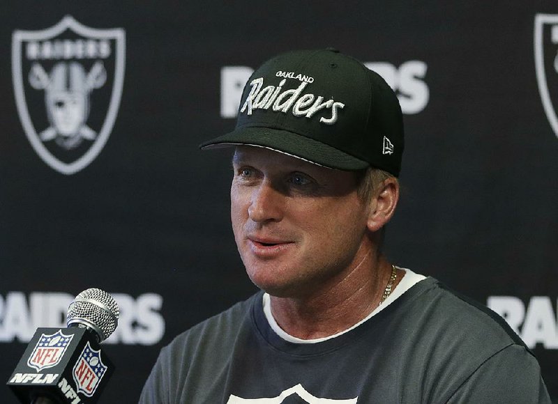 Oakland Raiders head coach Jon Gruden meets with the media after