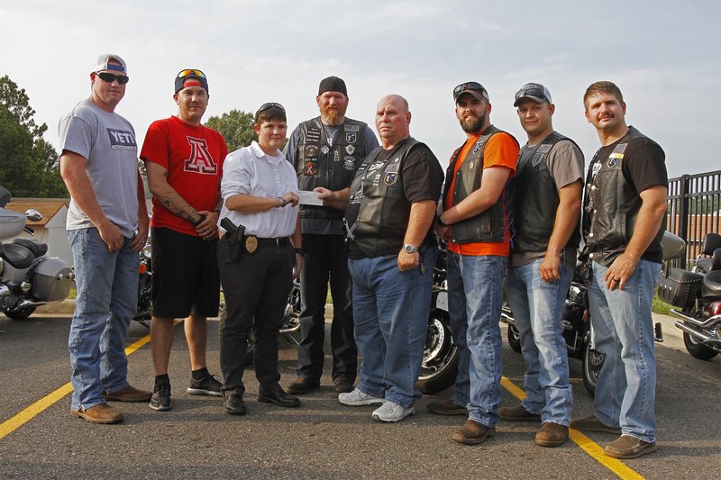 Defenders motorcycle club benefit ride raises money for sick officer