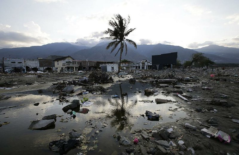 Rescuers Detect Presence In Rubble Of Indonesia Hotel