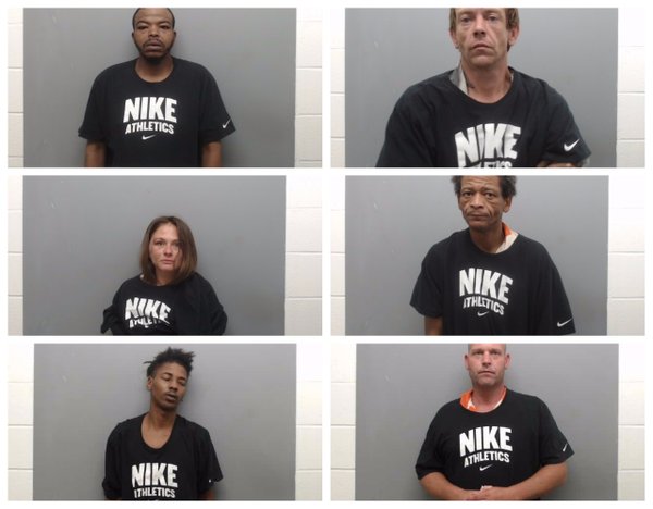 After mug shots draw attention, Arkansas sheriff says Nike shirt not meant to demean suspects