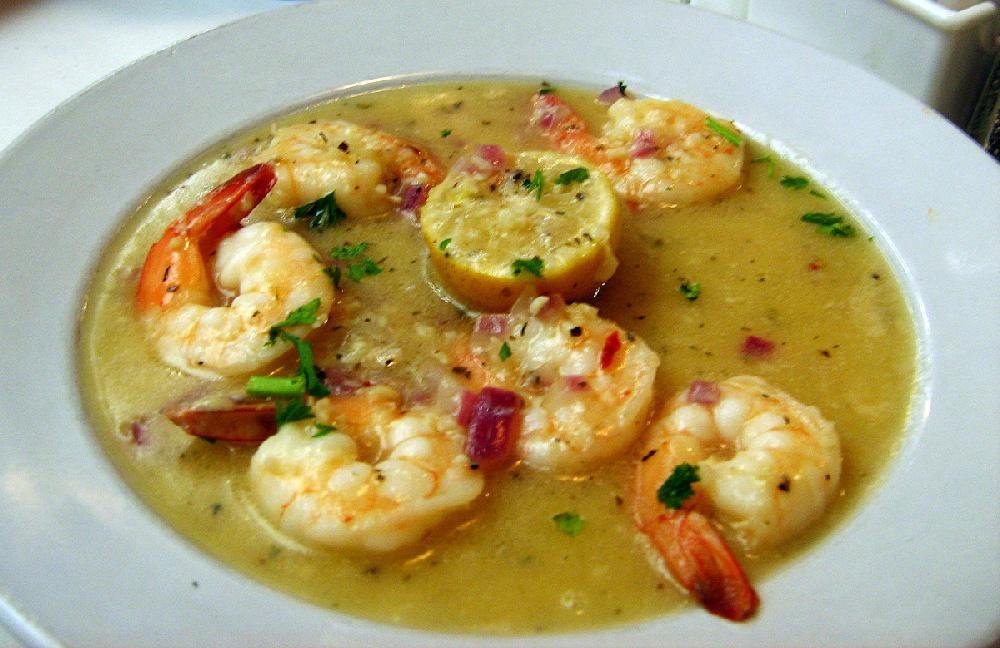 A side order of Shrimp Napolini at Roma Italian Restaurant in Jacksonville is made with jumbo shrimp sauteed with shallots in a white wine, lemon butter and garlic sauce.  