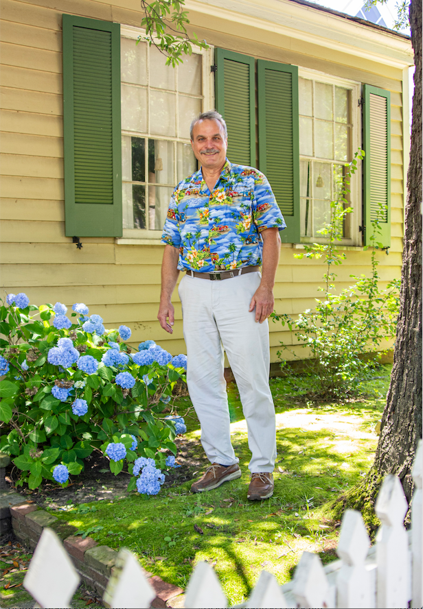 Conservator Andy Zawacki stands in front of the McVicar House at Historic Arkansas Museum. Zawacki, who is retiring this month, came to work at the museum in 1981. (Arkansas Democrat-Gazette/CARY JENKINS)