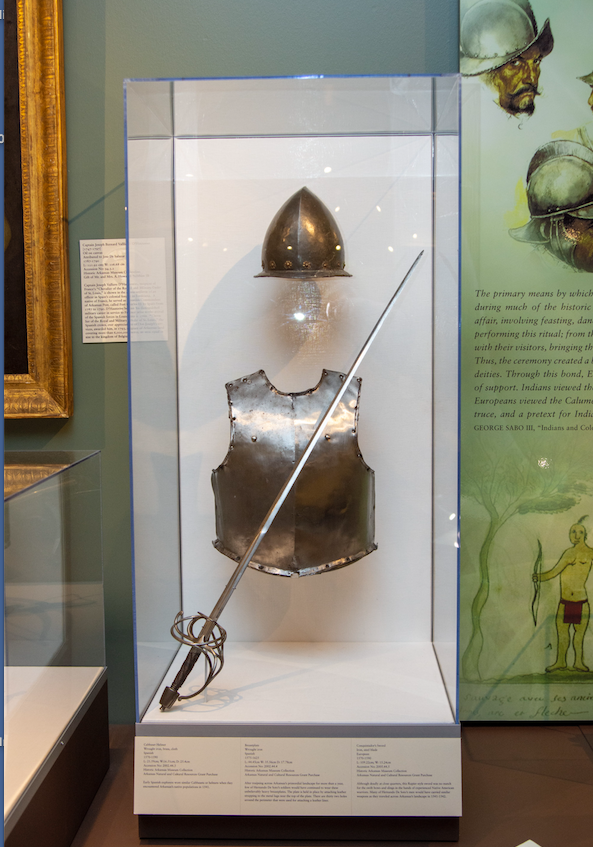 A Spanish helmet and breastplate and rapier appear to hover gracefully in the American Indian Gallery at Historic Arkansas Museum. The display was created by Andy Zawacki, the museum's object conservator. (Arkansas Democrat-Gazette/CARY JENKINS) 