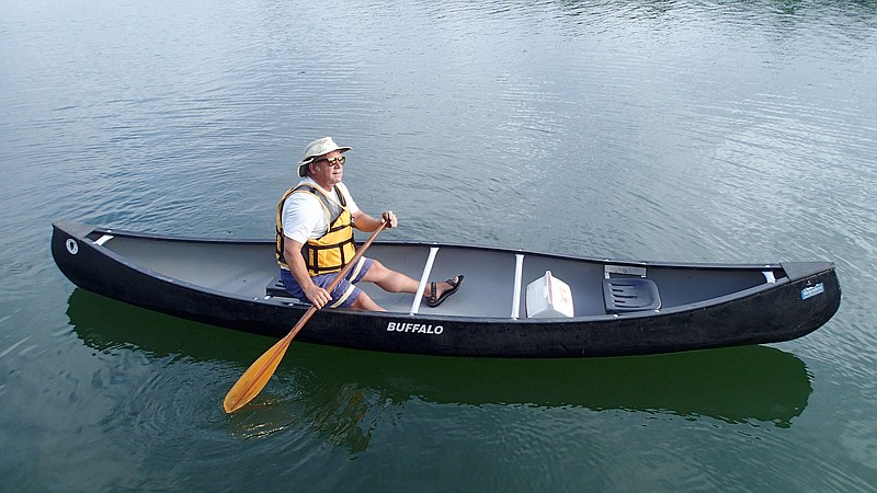 No trick to paddle solo in a tandem canoe