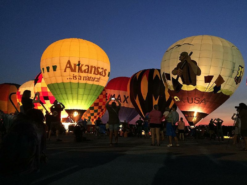 Big balloons glimmer at Harrison's festival