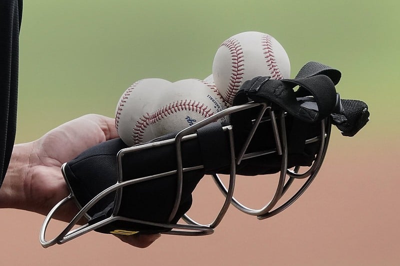 Pandemic-shortened MLB season kicks off with rain-shortened game