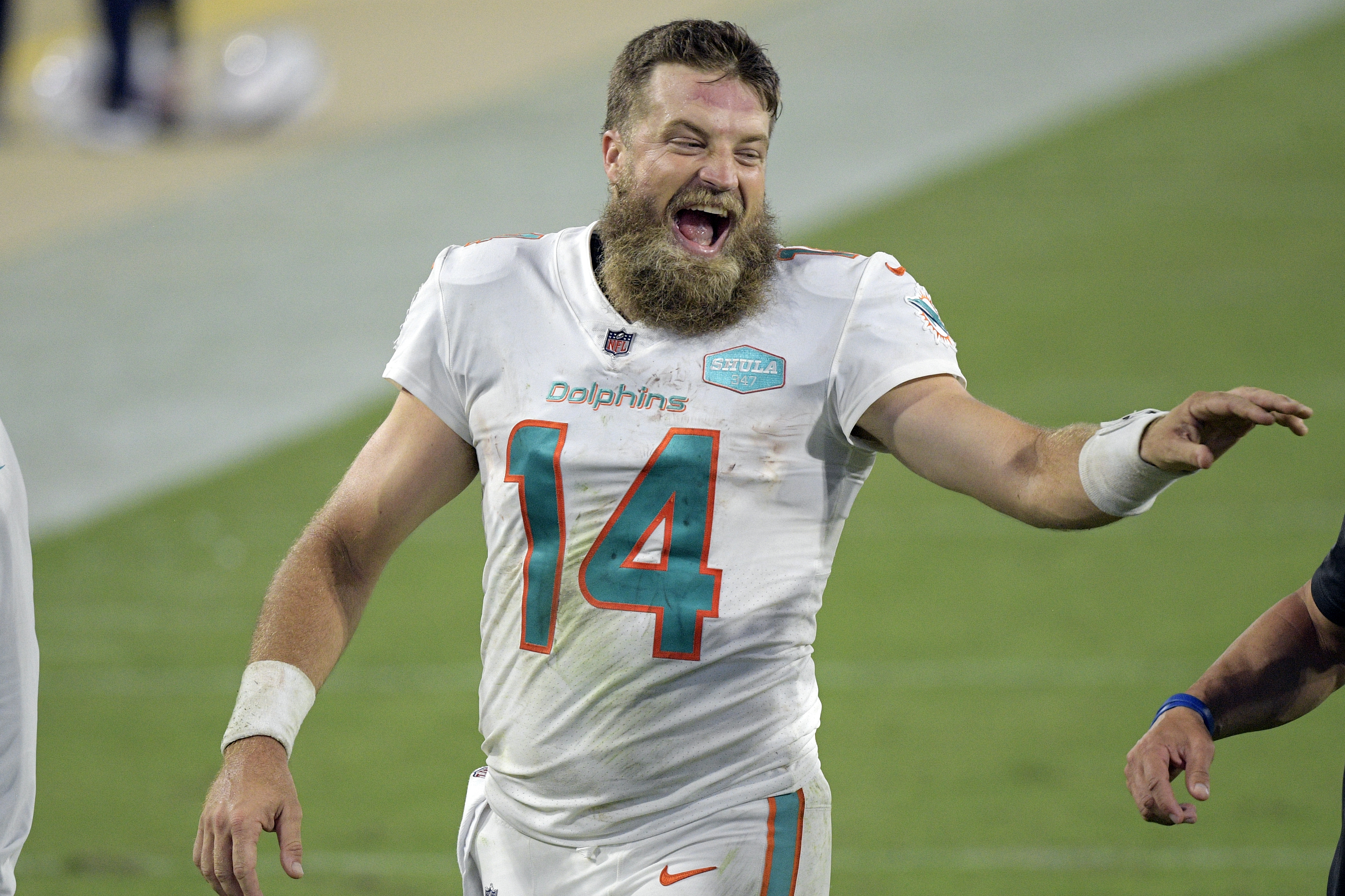 Miami Dolphins quarterback Ryan Fitzpatrick (14) throws a pass