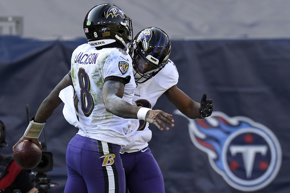 Unrattled Ravens storm past Titans