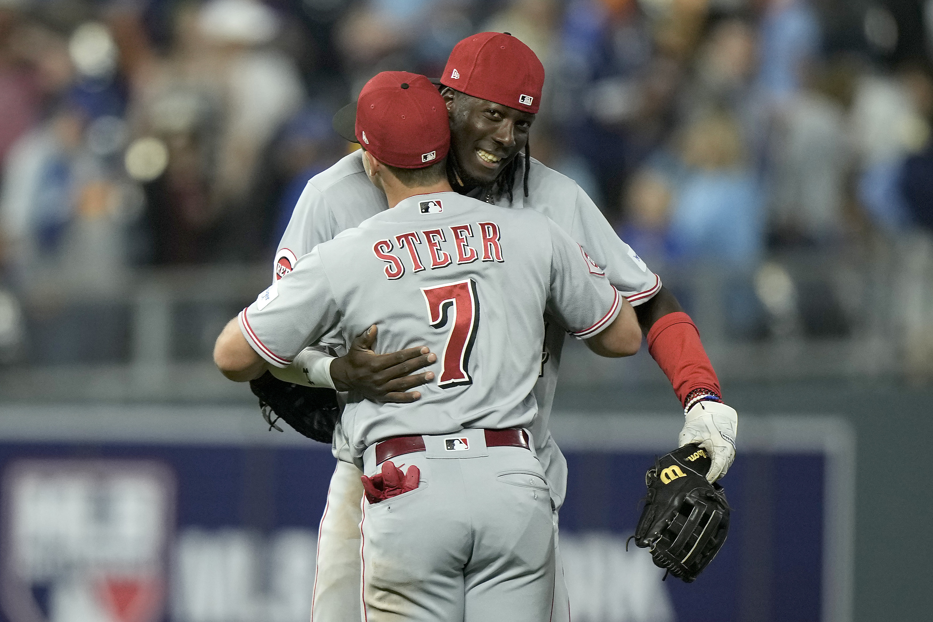 Cincinnati Reds' Spencer Steer (12) celebrates with Cincinnati