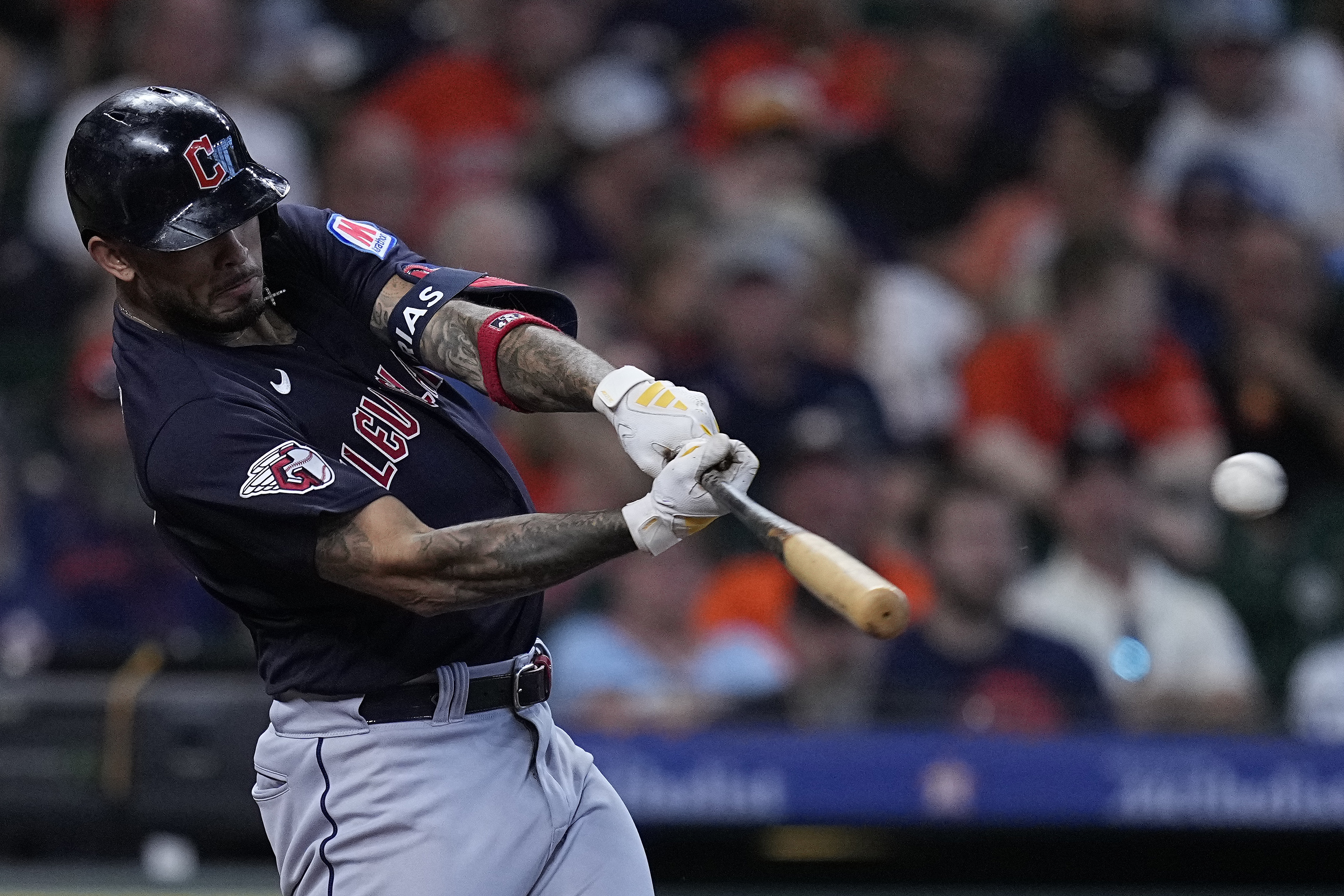 Houston Astros starting pitcher Ronel Blanco tosses a comebacker from  Cleveland Guardians' Steven Kwan to first base for an out during the fourth  inning of a baseball game, Wednesday, Aug. 2, 2023